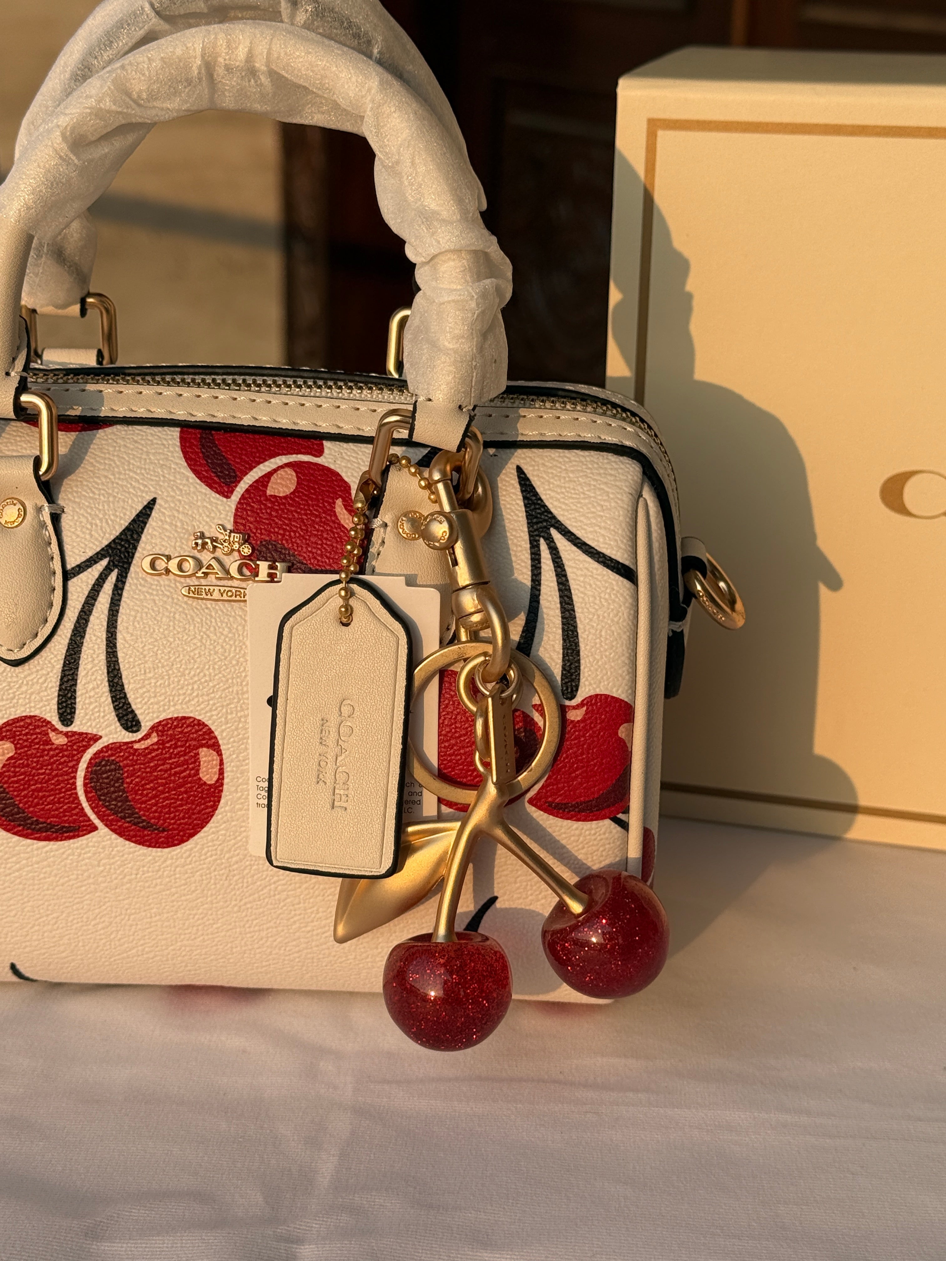 COACH WHITE CHERRY PATTERN BAG WITH CHERRY CHARM