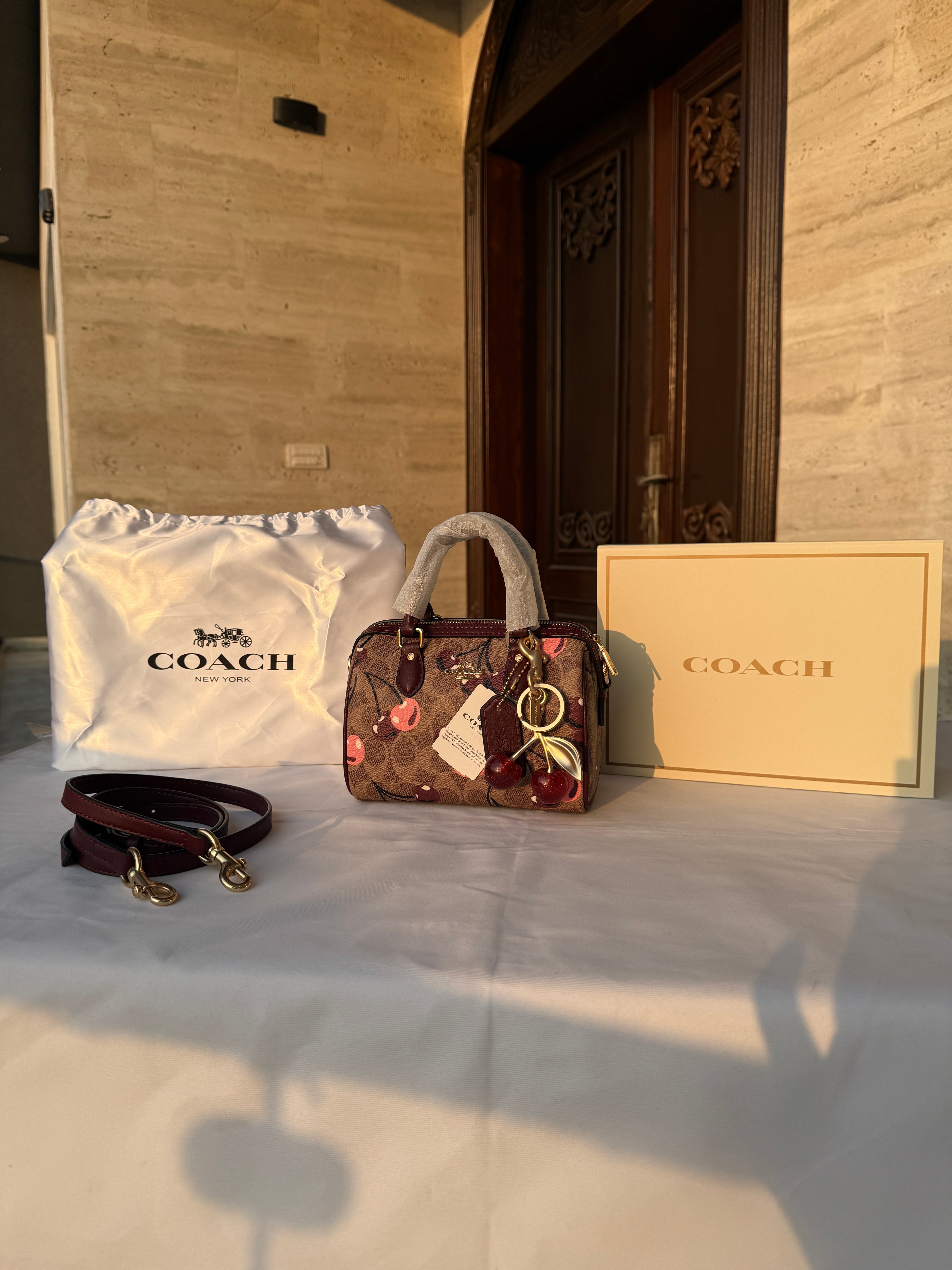 COACH DARK BROWN CHERRY PATTERN BAG WITH CHERRY CHARM