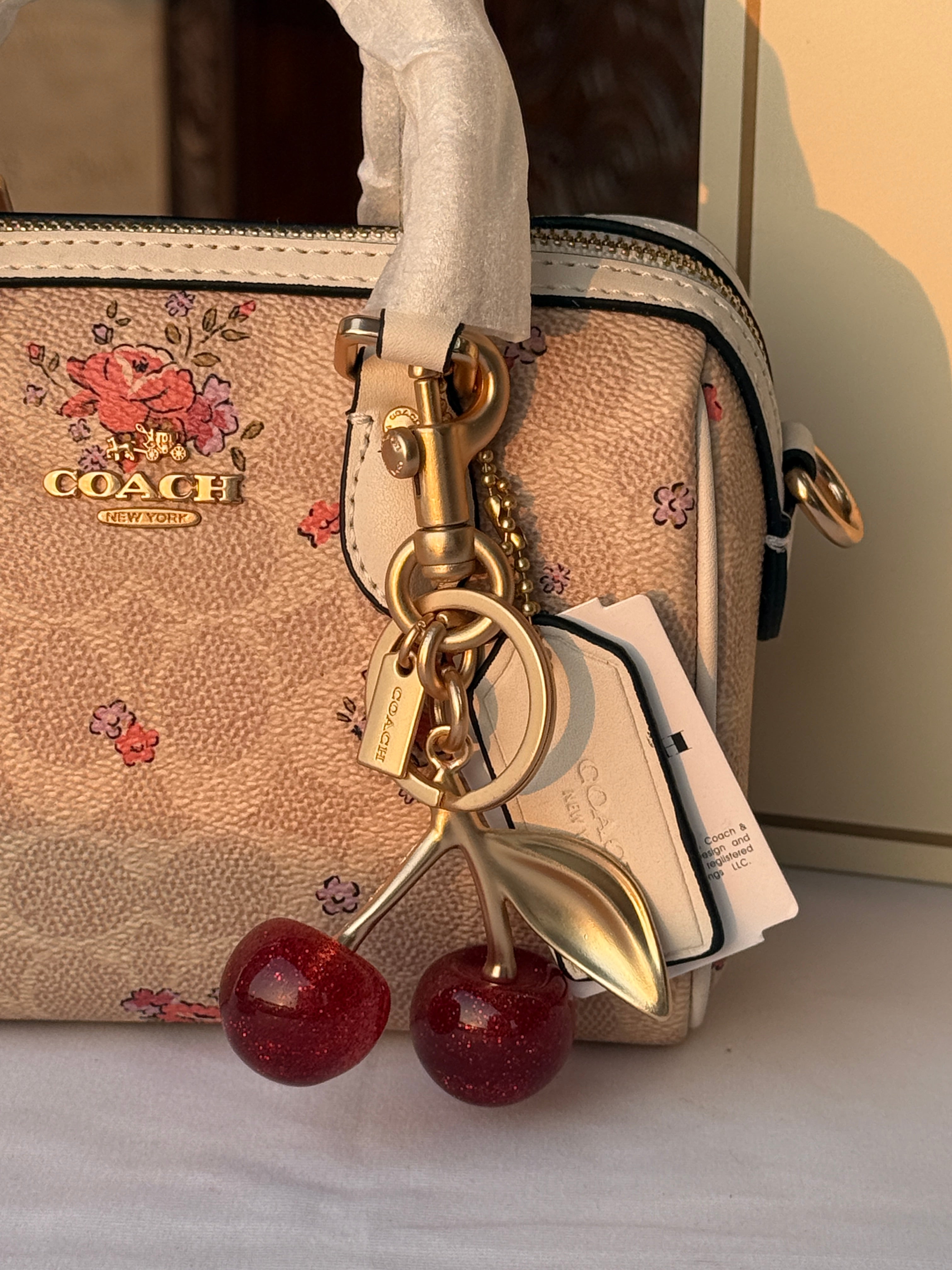 COACH LIGHT BROWN FLOWER PATTERN BAG CHERRY CHARM